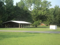 Pavilion and well in the Greenhaw community north of Cowan.